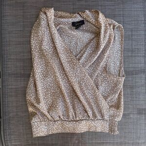 silky wrap animal print sleeveless blouse